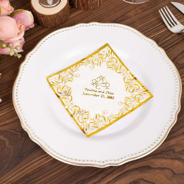Elegant gold-embellished wedding napkin on a decorative plate.
