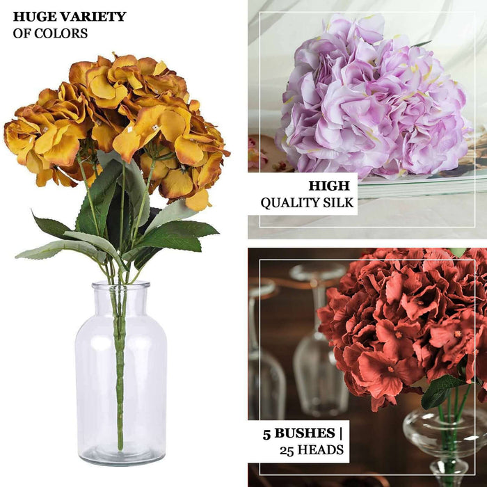 Silk floral arrangement in vibrant colors, displayed in a clear vase.