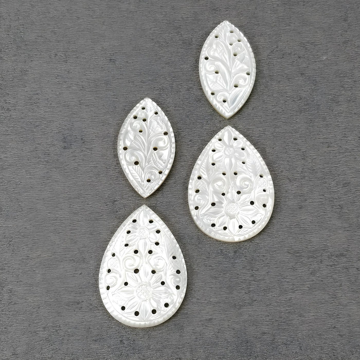 mother of pearl marquise, oval carving