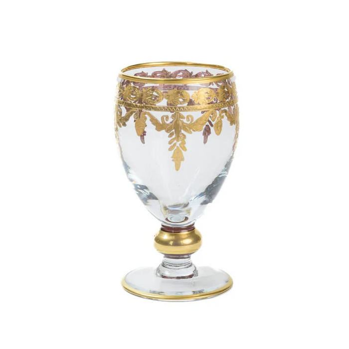 Decorative glass goblet with gold embellishments