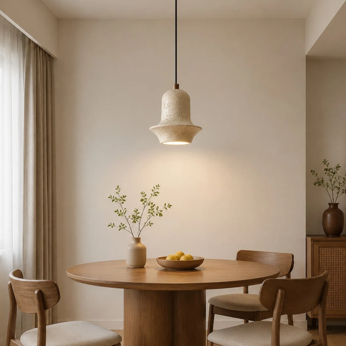 Bellora Sculpted Travertine Pendant Light - lifestyle above a round dining table