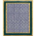 A square framed textile or wall hanging with a repeating ornate damask-style pattern in navy blue and cream, surrounded by a wide dark teal-green border and a decorative gold frame.