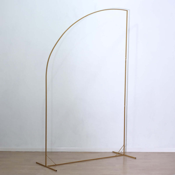 Gold arch display stand on a plain backdrop.