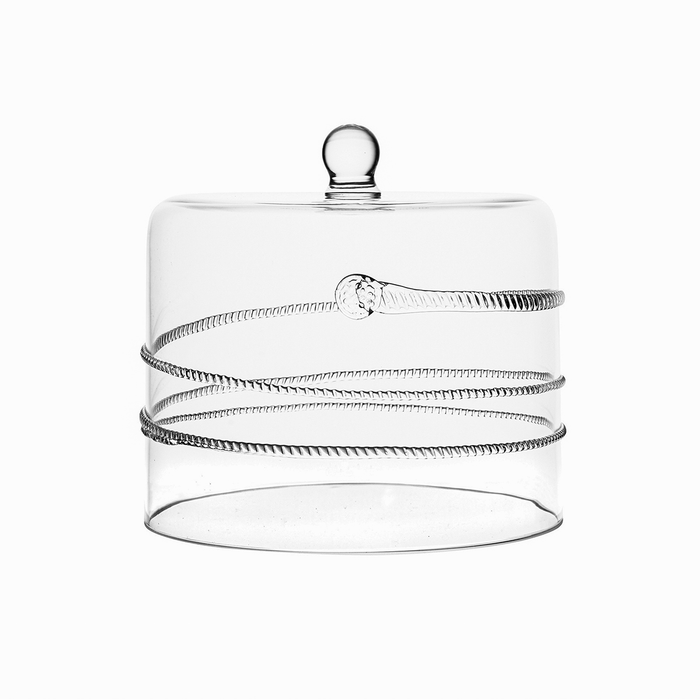 Clear glass container with decorative ribbons on a white background