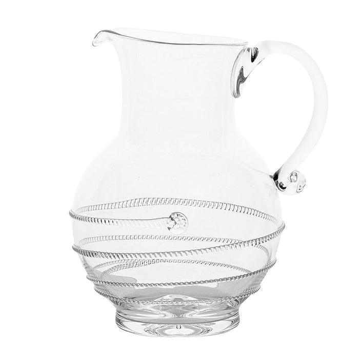 Clear glass pitcher with decorative ribbing