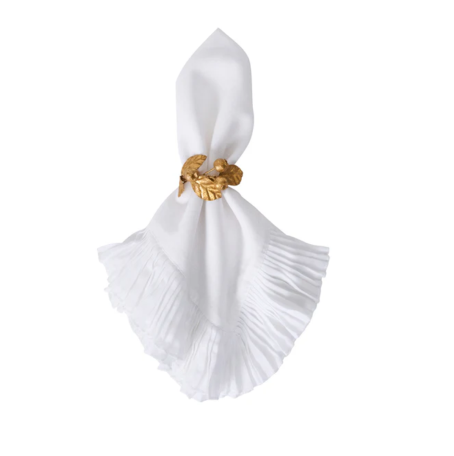 white napkin held by a blueberry gold napkin ring