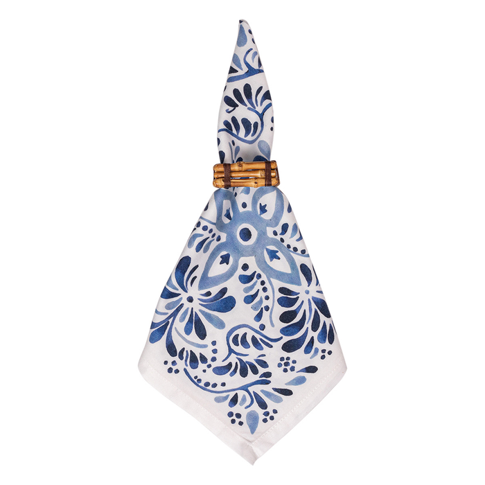 Napkin with blue floral pattern and bamboo bring