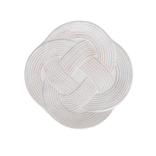 white plate with knot designs