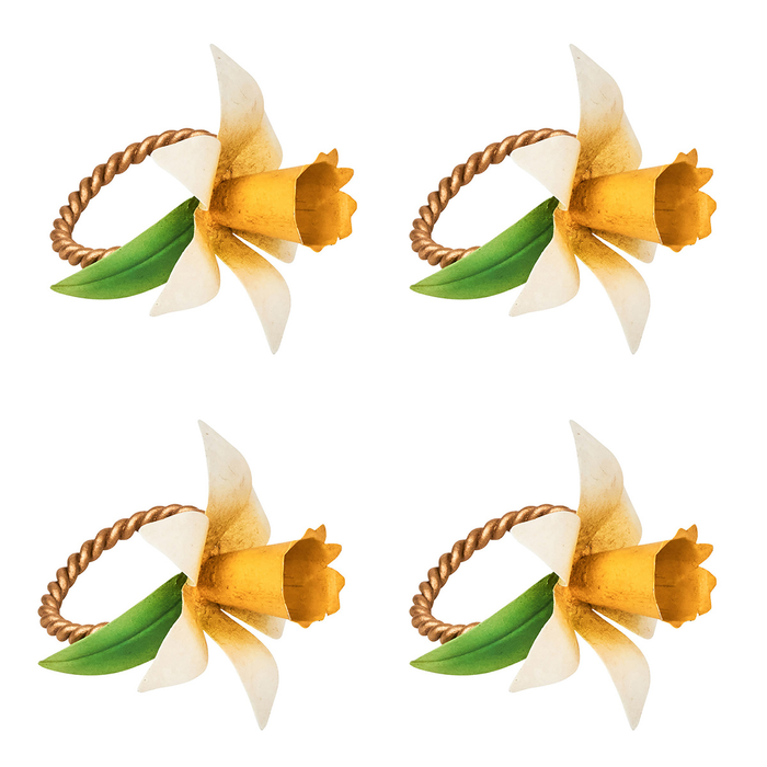 Four sculptural napkin rings in the shapes of daffodil flowers