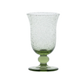 Green glass with bubble texture on a white background