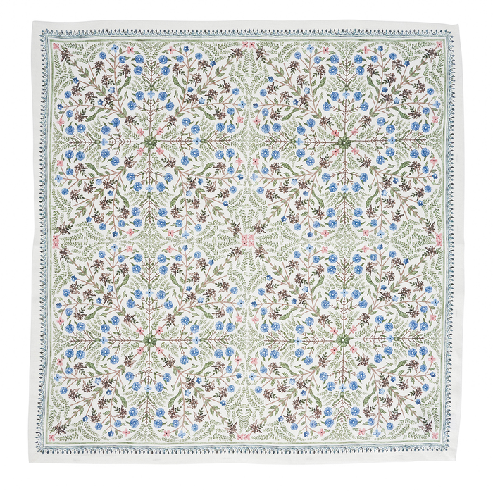 A square napkin featuring a detailed botanical and floral pattern arranged in a grid. The design includes sage green, dusty blue, soft pink, and brown elements on a cream background, finished with a decorative border.