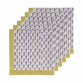 A set of five folded napkins with a white background, blue floral block print, and a mustard yellow border