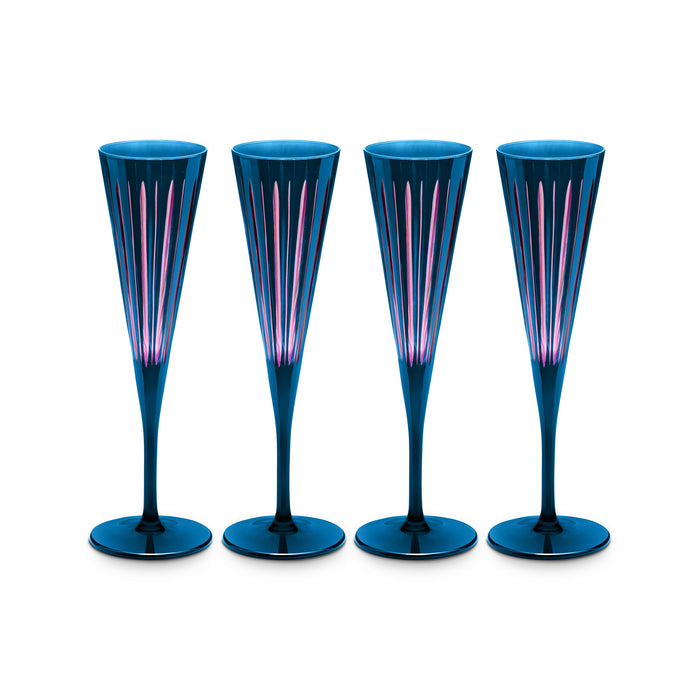 Four blue champagne flutes with pink interior