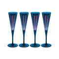 Four blue champagne flutes with pink interior