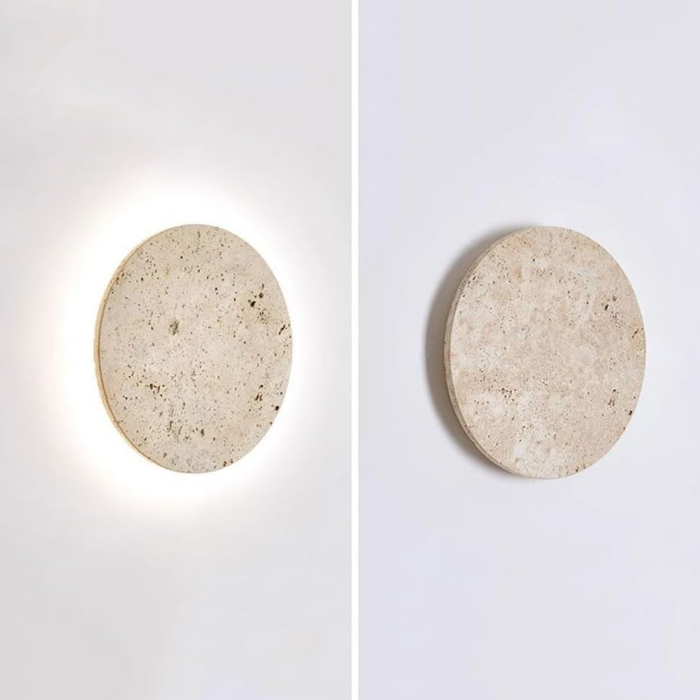 Lunaro Travertine Round Wall Sconce - split view showing lit front and unlit side profile