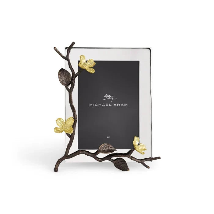 silver photo frame with dogwood design on a white background set up in a 5 by 7 inch orientation