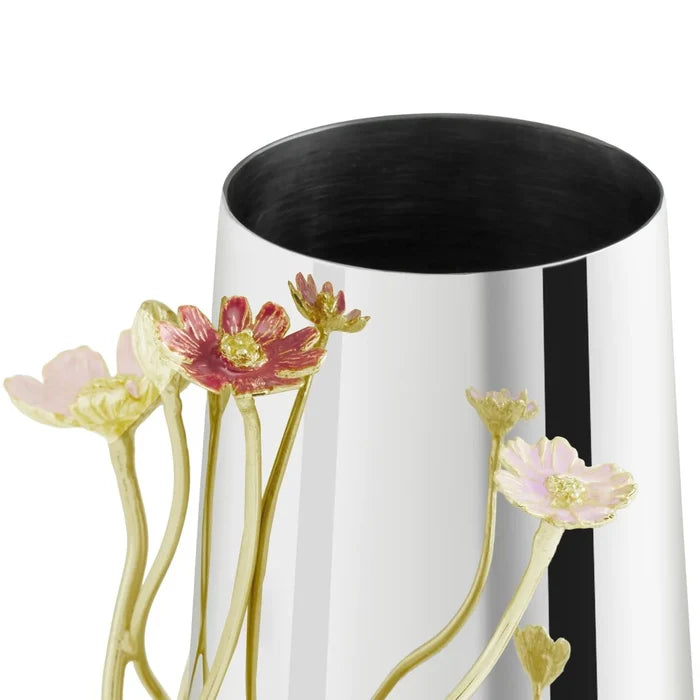 The opening of a silver, gold, pink, and red wildflower vase