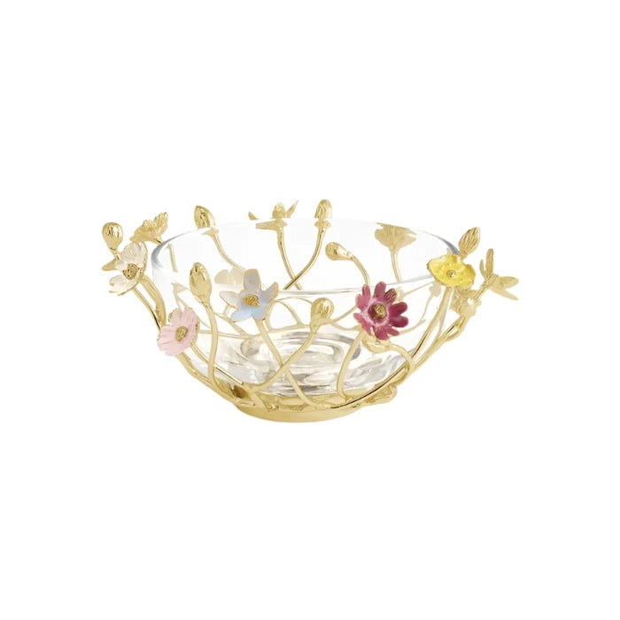 A small, gold-colored metal bowl with a floral pattern, featuring hand-enameled details in muted tones.