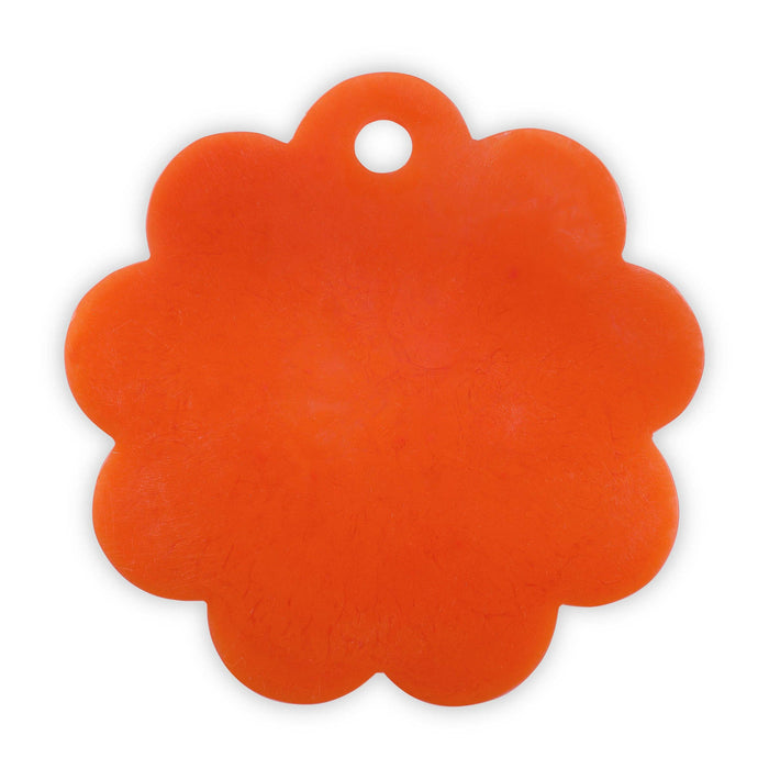 Orange pet tag with a scalloped edge on a white background