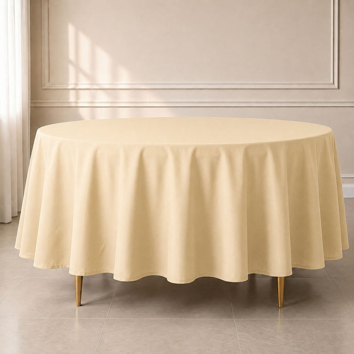 Beige round tablecloth, durable and stain-resistant for easy maintenance.