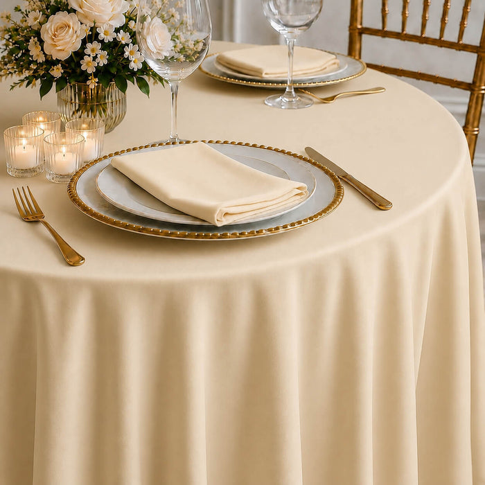 Beige polyester round tablecloth, durable and stain-resistant.