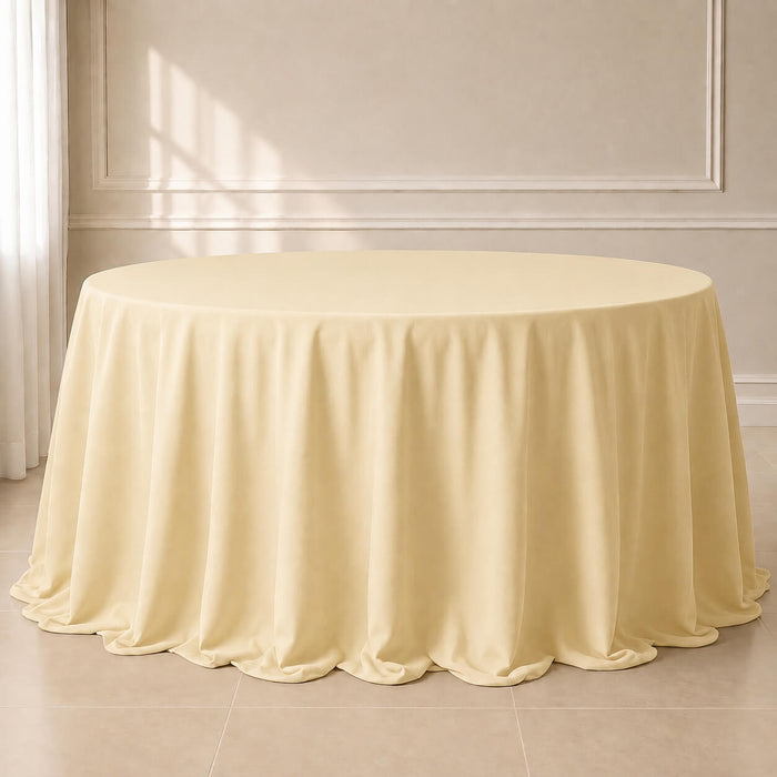 Beige seamless finish round tablecloth for elegant dining settings.