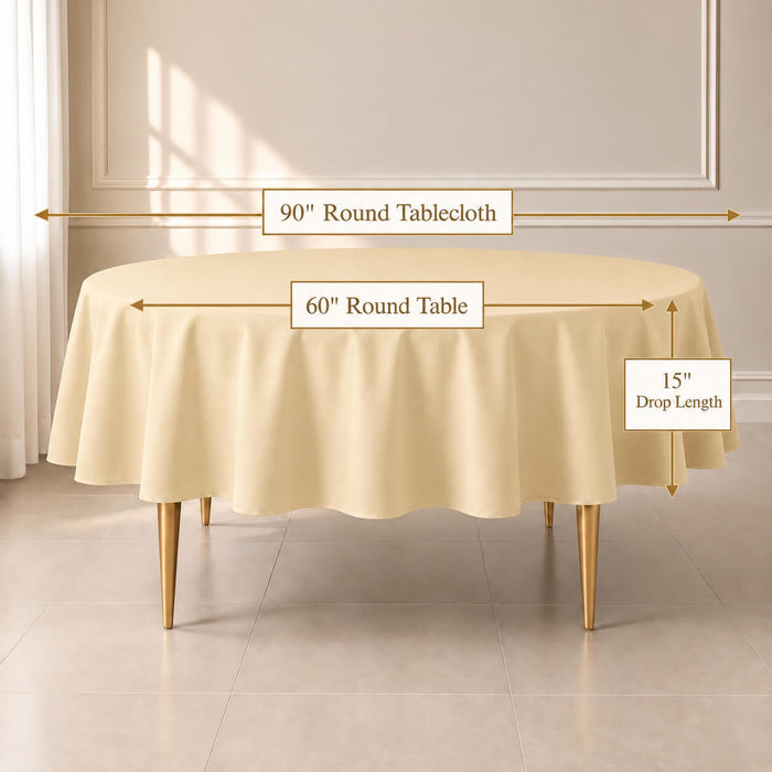 A round table covered with a beige-colored tablecloth in a bright room, with measurement labels showing 90 inches for a 60-inch round table and 15-inch drop length.