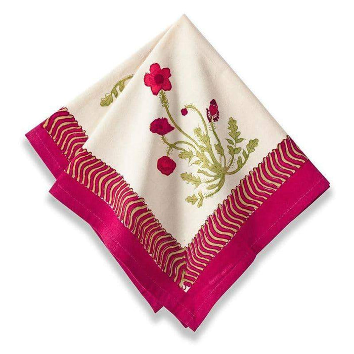 A folded linen napkin with a green and red floral pattern and a striped border on a white background.