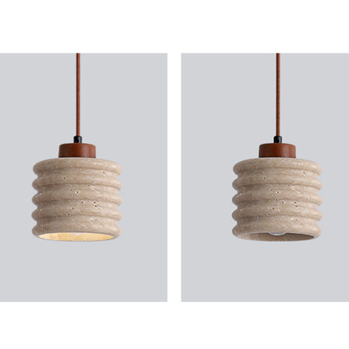 Ribelle Travertine Pendant Light - split view showing lit front and unlit interior
