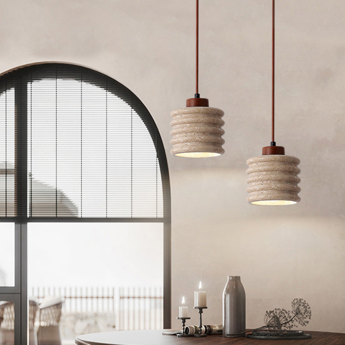 Ribelle Travertine Pendant Light - lifestyle two pendants above a dining table near an arched window