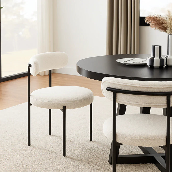 Dining table with chairs in a modern interior setting