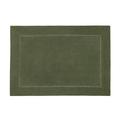 A green placemat with a stiched hem