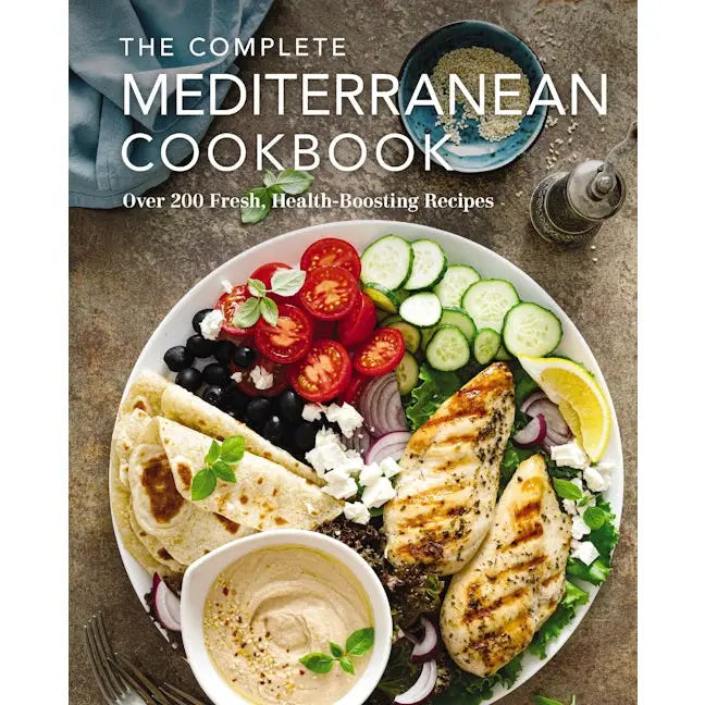 Book cover of 'The Complete Mediterranean Cookbook' with a plate of salad and grilled chicken.
