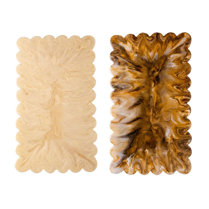 Two decorative items with textured surfaces, one beige and one brown, on a white background.