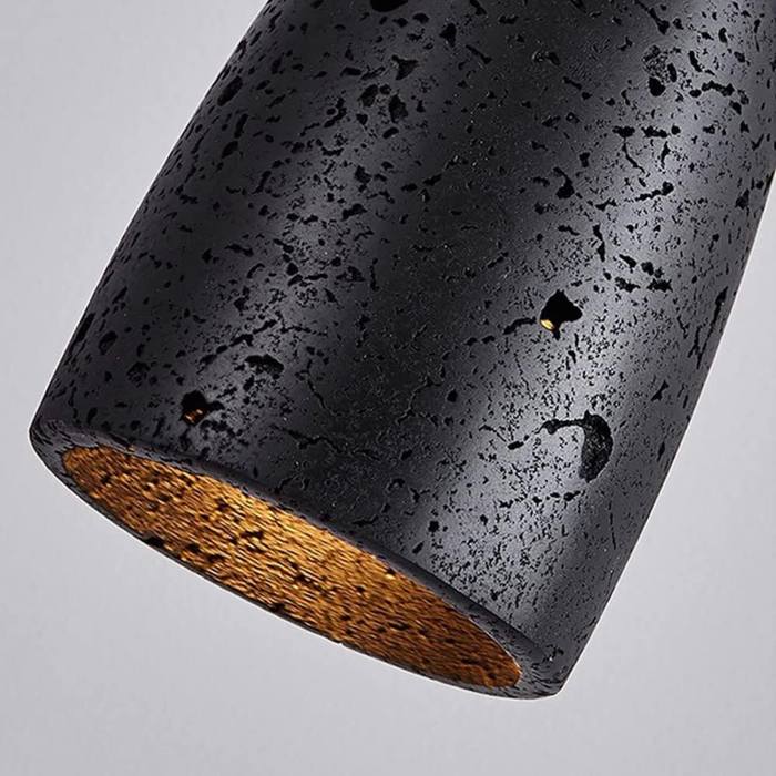 Vellora Travertine Drop Pendant Light Black - close-up of shade texture and underside glow