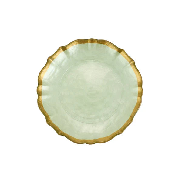 Light green plate with ruffled gold rim on a white background