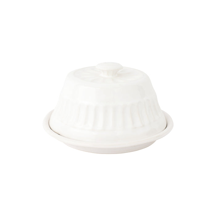 A white ceramic container with a domed top