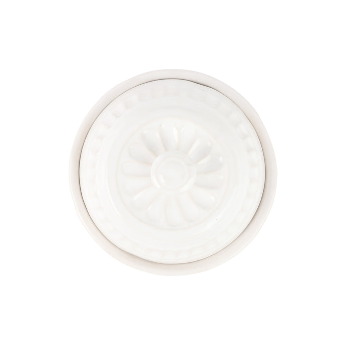 The top of a ceramic domed container